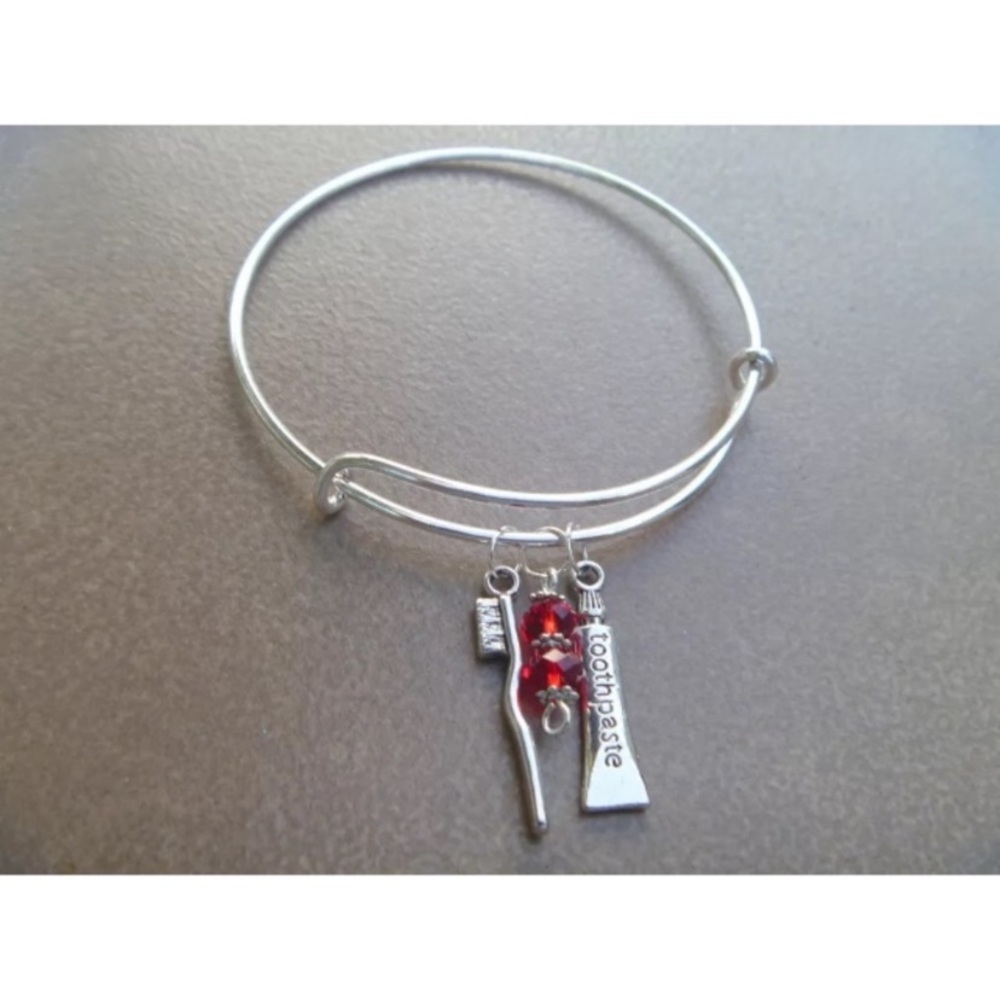 Toothbrush and toothpaste adjustable bangle bracelet